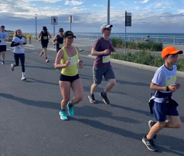 at the 8k mark of this year's Times Colonist 10k.